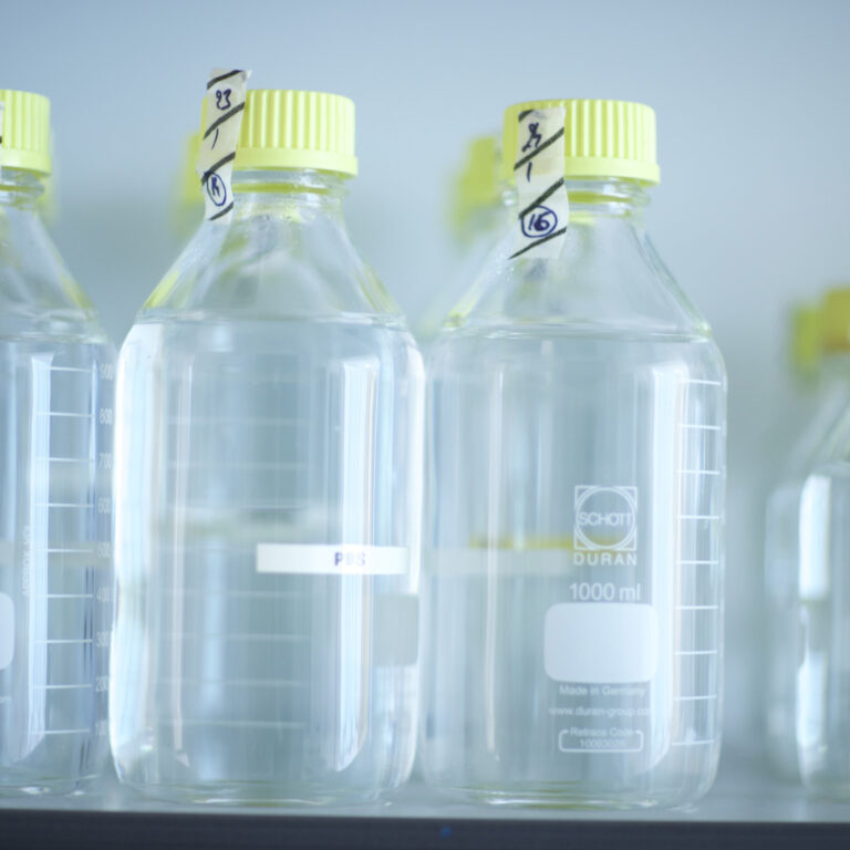 Vials on a shelf within the laboratory