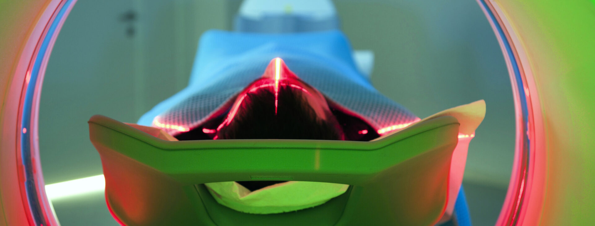 Patient laying on a CT scan platform