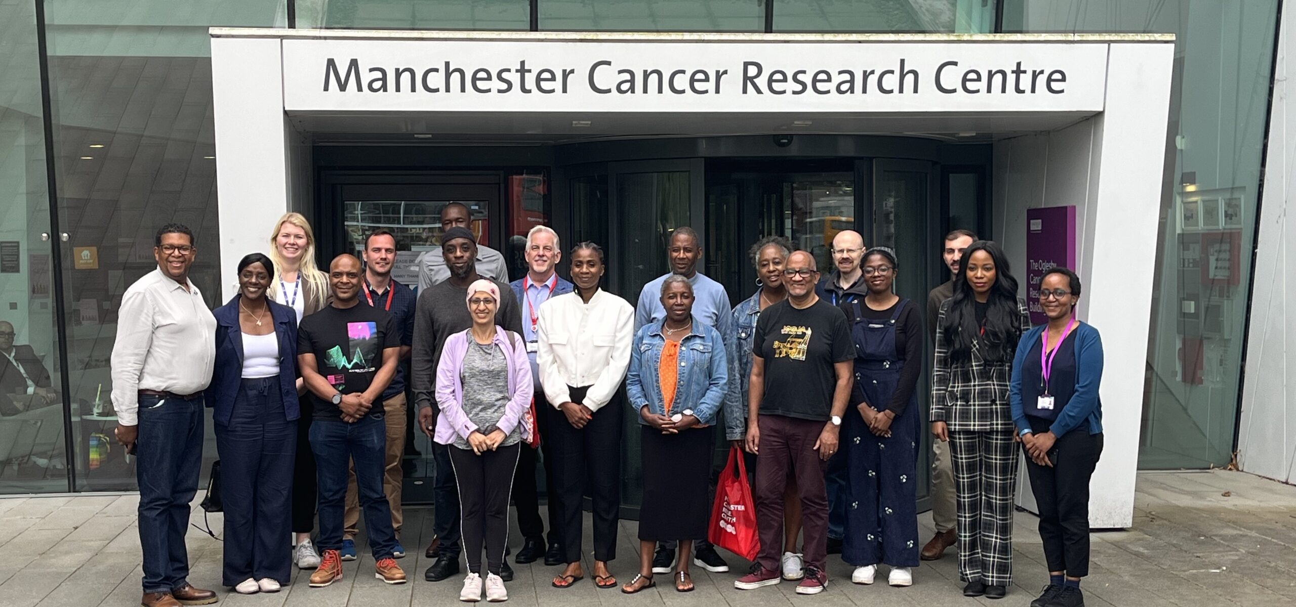 Delegates from Can Survive UK and the MCRC outside the Oglesby Cancer Research Building in Manchester